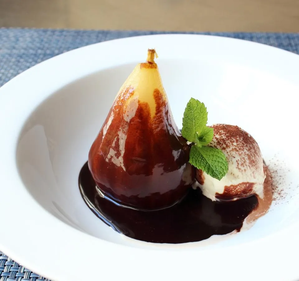 Poached Fresh Pears in White Burgundy with Chocolate Sauce