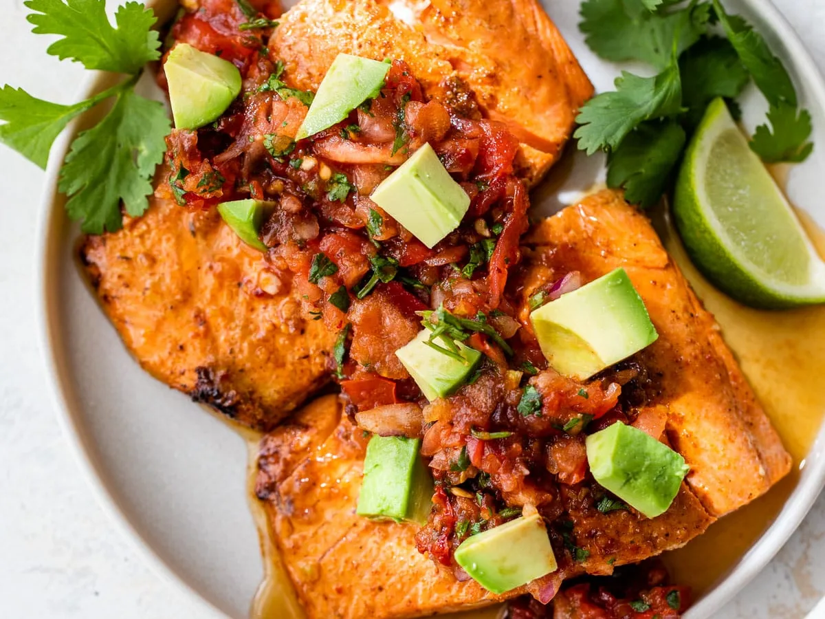 Salmon with Cumin-Coriander Crema and Chipotle Salsa